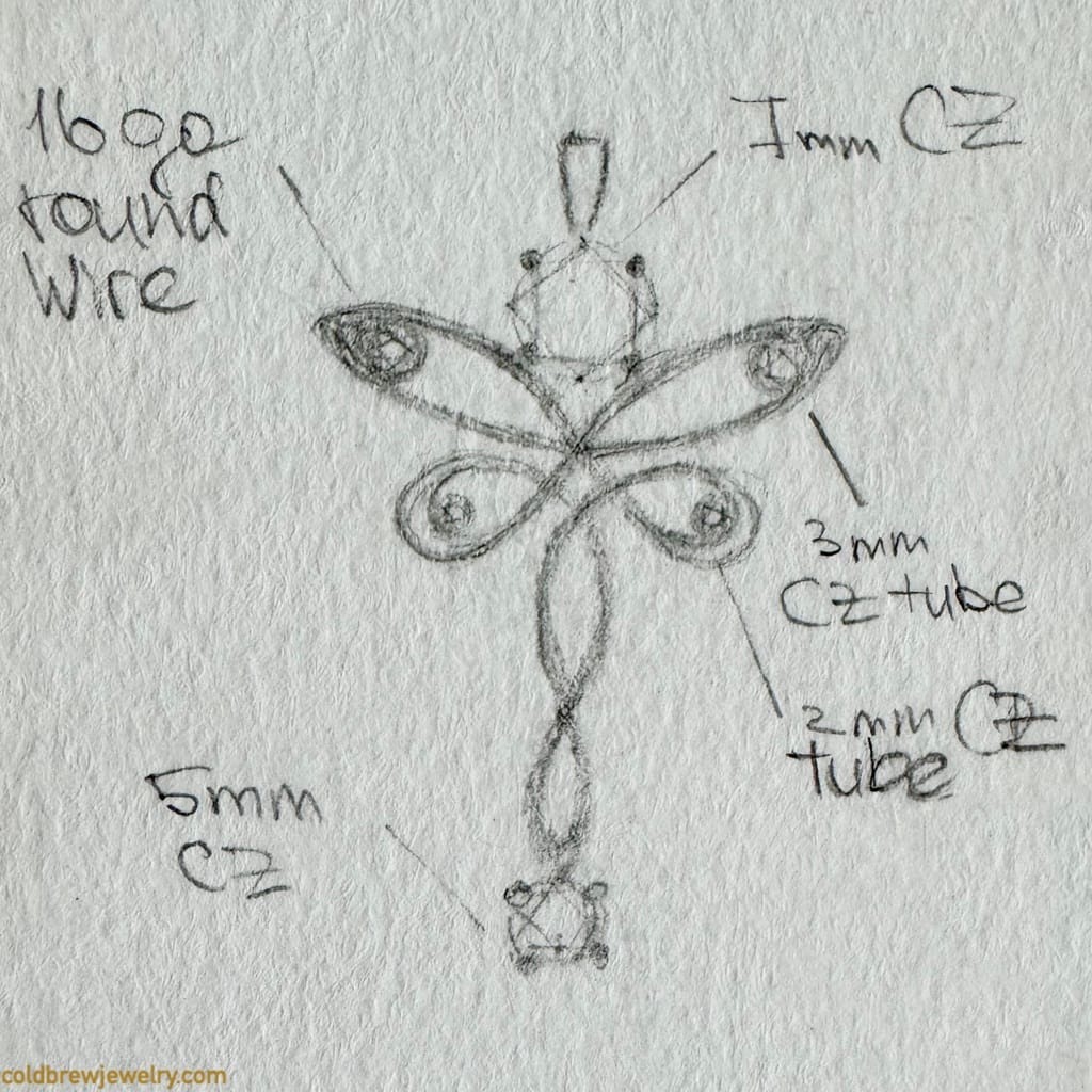 Pencil sketch of a butterfly pendant