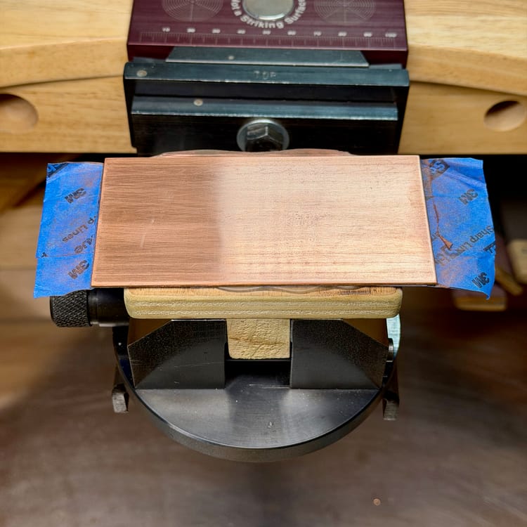 A practice engraving plate in a