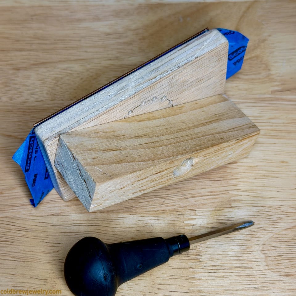 Wooden workholding fixture for engraving